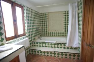 Vannituba majutusasutuses La Casona de los Colibríes