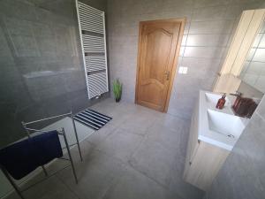 Koupelna v ubytování Tussenbeke + 14 fotografií