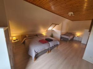 Posteľ alebo postele v izbe v ubytovaní Tussenbeke