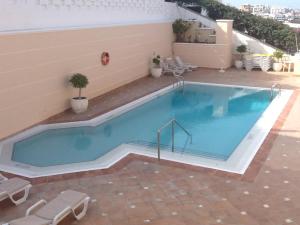 The swimming pool at or close to Apartamentos Buenavista II