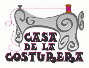 Un póster con un perro y la búsqueda de palabras ser como un curador en Casa de La Costurera, en Priego de Córdoba