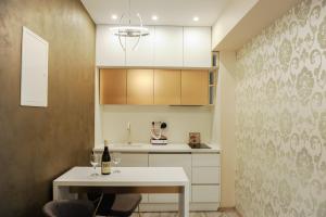 Η κουζίνα ή μικρή κουζίνα στο Apartmani President II +27 φωτογραφίες