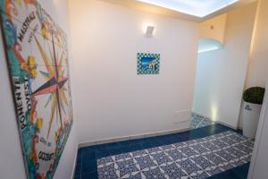 Postel nebo postele na pokoji v ubytování Palazzo Vingius