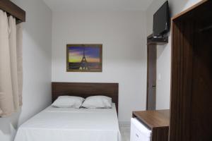 Posteľ alebo postele v izbe v ubytovaní Hotel Joia Fina