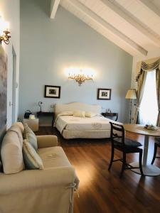 A bed or beds in a room at Villa Rigatti