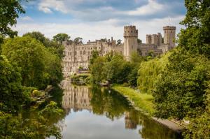 a view of windsor castle from the river derwent at Church Bells House by Spa Town Property - 3 Bedroom Georgian Townhouse in Central Warwick in Warwick