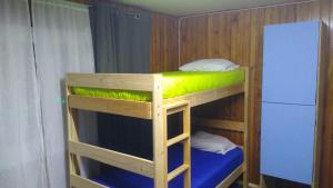 Katil atau katil-katil dalam bilik di Islanet Hostel & Bar