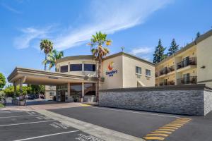 a rendering of the front of a hotel with a parking lot at Comfort Inn Sunnyvale – Silicon Valley in Sunnyvale