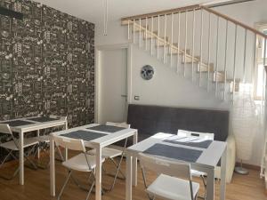 A seating area at Villa Ghisolfa by Rhospitality it