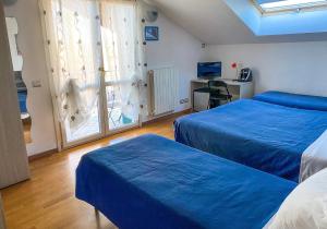 A bed or beds in a room at Villa Ghisolfa by Rhospitality it