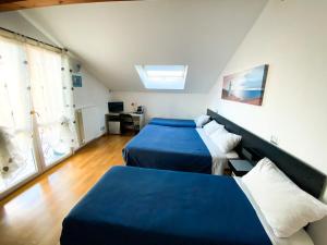 A bed or beds in a room at Villa Ghisolfa by Rhospitality it