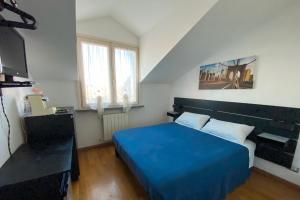 A bed or beds in a room at Villa Ghisolfa by Rhospitality it