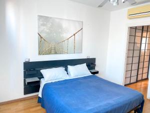 A bed or beds in a room at Villa Ghisolfa by Rhospitality it