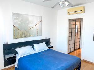 A bed or beds in a room at Villa Ghisolfa by Rhospitality it
