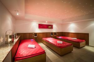 Llit o llits en una habitació de Hotel Tannenberg