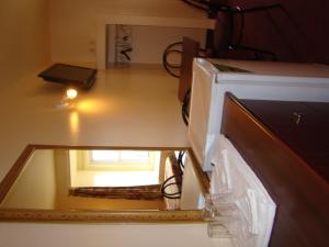 a glass counter top with a window in a room at Hotel Quartier Latin in Montreal