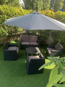 A garden outside Villa Ghisolfa by Rhospitality it