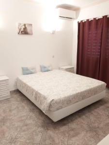 Postel nebo postele na pokoji v ubytování Vivenda ROSA Albufeira + 54 fotografií