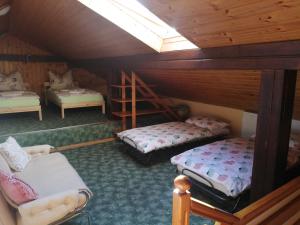 Un pat sau paturi într-o cameră la Bella Patria