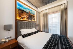 Posteľ alebo postele v izbe v ubytovaní ApartmentPrestige Central Station