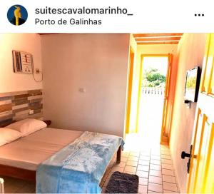 a bedroom with a bed and a door to a room at Suítes Cavalo Marinho in Porto De Galinhas +9 photos