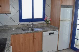 A kitchen or kitchenette at Casa Tacande