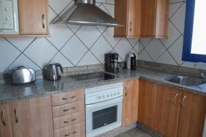 A kitchen or kitchenette at Casa Tacande