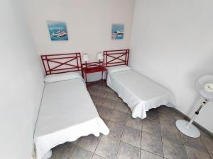 A bed or beds in a room at Casa Tacande