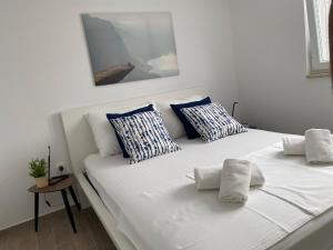 Postel nebo postele na pokoji v ubytování Apartman Roko Duboka by aneo travel