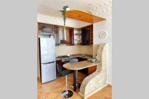 Kuchyň nebo kuchyňský kout v ubytování Appartement vue mer panoramique