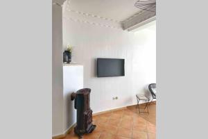 TV a/nebo společenská místnost v ubytování Appartement vue mer panoramique