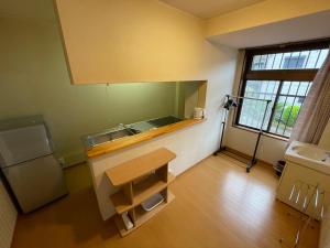 Kuchyň nebo kuchyňský kout v ubytování Hotel Isodokei