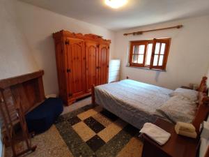 Posteľ alebo postele v izbe v ubytovaní Appartamento con giardino privato.