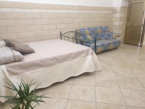 Ein Bett oder Betten in einem Zimmer der Unterkunft Casa del Sole