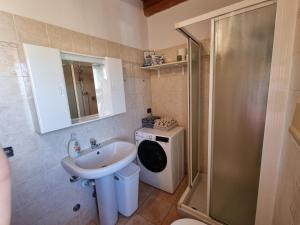 Ένα μπάνιο στο ANTICA CORTE ORTAIA APPARTAMENTI