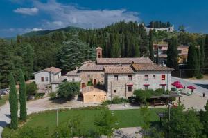 an aerial view of a large house in the mountains at RICASOLI, Brolio Agriroom in Gaiole in Chianti