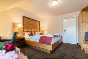 Postel nebo postele na pokoji v ubytování Hotel Restaurant Waldsägmühle
