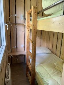 Postel nebo postele na pokoji v ubytování Chalet des Campanules avec Sauna