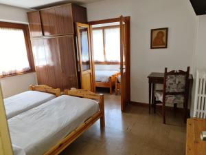 Letto o letti in una camera di Hotel Daniela