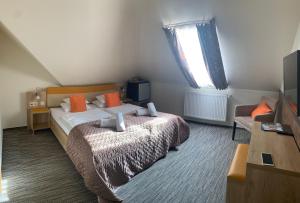 Posteľ alebo postele v izbe v ubytovaní Hotel Dolce Vita