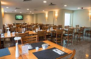 Restoran atau tempat lain untuk makan di Flat Barra First