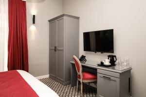 Postel nebo postele na pokoji v ubytování Casa Reale Boutique Hotel