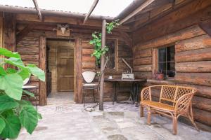 Patio alebo iná vonkajšia časť ubytovania Pajta Apartman