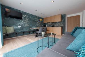 TV a/nebo společenská místnost v ubytování Lapis Monti - Apartments & Suites