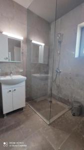 A bathroom at Lighthouse Apartments and Villas