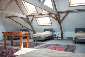 Ein Bett oder Betten in einem Zimmer der Unterkunft Avant Garde