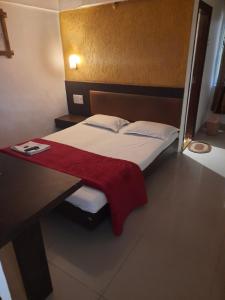 Postel nebo postele na pokoji v ubytování HOTEL S K PALACE