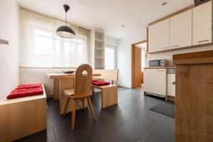 Kuchyň nebo kuchyňský kout v ubytování Lapis Monti - Apartments & Suites