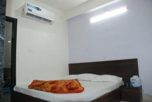 Letto o letti in una camera di Hotel Chouhan Paradise