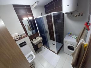 Kylpyhuone majoituspaikassa AAA Apartment